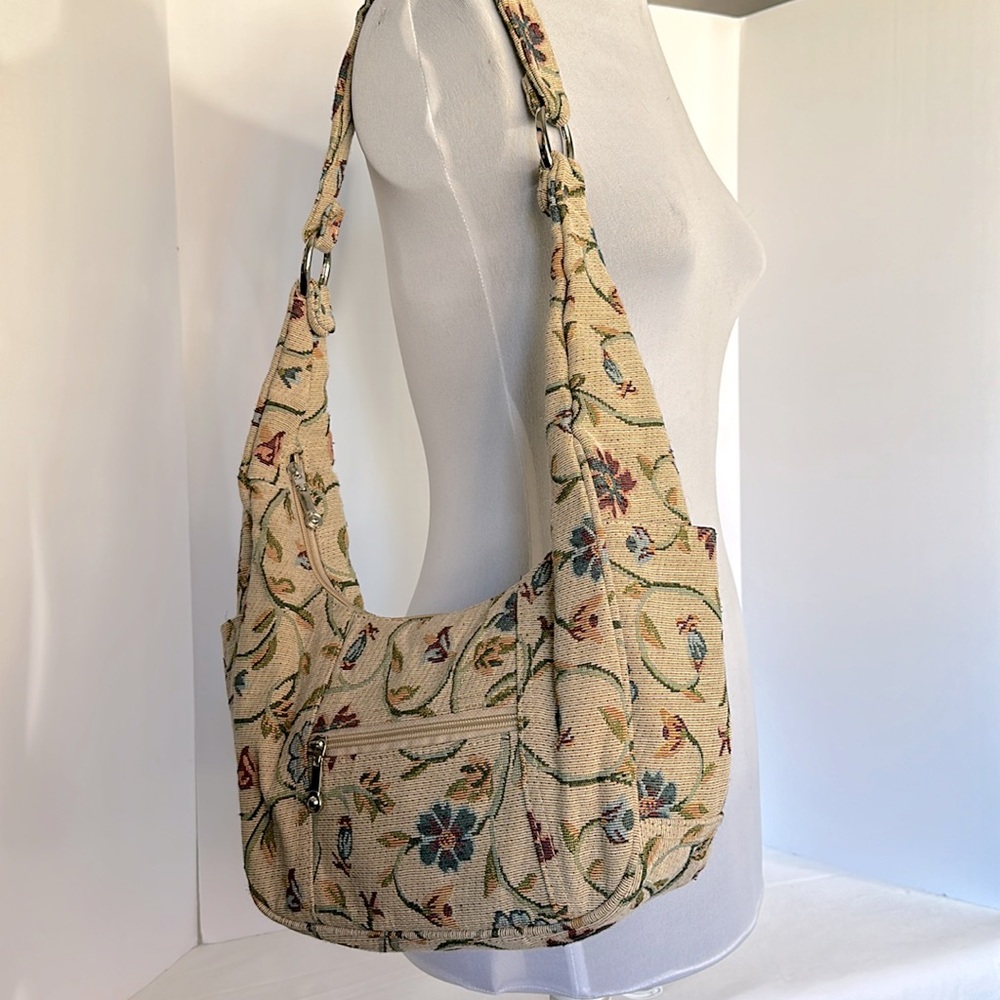 100% cotton hobo shoulder bag woven multi color  floral design on tan fabric.